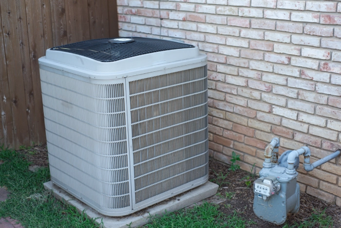 FP Mechanical technician performing preventive HVAC maintenance